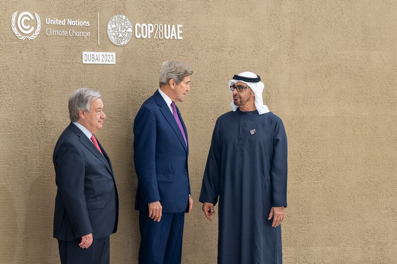 President Sheikh Mohamed with US Special Presidential Envoy for Climate John Kerry and the UN Secretary General. Eissa Al Hammadi / UAE Presidential Court 