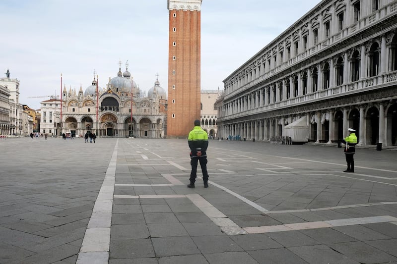 The almost empty St. Mark's Square is seen after the Italian government an extension of the shutdown in Italy including Venice to try to contain a coronavirus outbreak, in Venice, Italy. Reuters