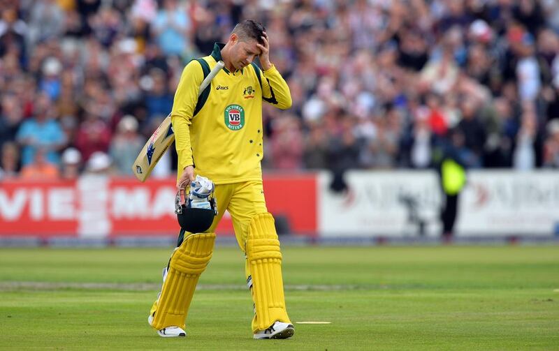 Michael Clarke's lower back injury will keep him from performing in the India one-day series, set to begin on October 11. Paul Ellis / AFP