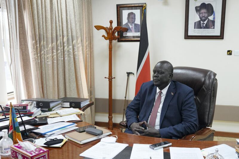 Honorable Deng Dau Deng Malek, Deputy Minister of Foreign Affairs, is posing for a photo in his office, in the Ministry of Foreign Affairs, in Juba, South Sudan, on June 21, 2021. 
