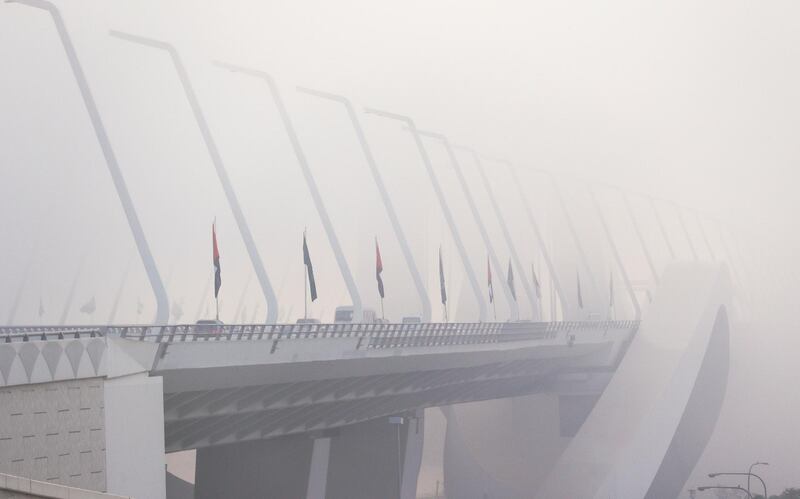 Abu Dhabi, United Arab Emirates, September 22, 2020.  The Sheikh Zayed Bridge is engulfed by fog on a Tuesday morning.
Victor Besa/The National
Section:  Standalone/Weather
