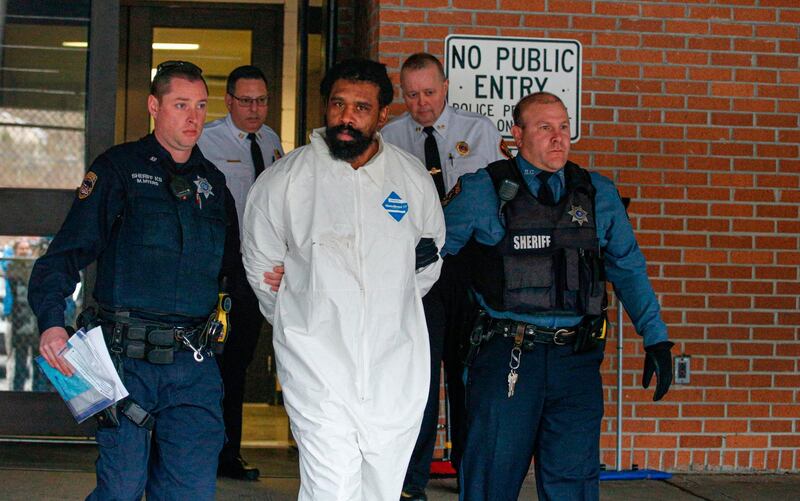 TOPSHOT - Suspect in Hanukkah celebration stabbings Thomas Grafton, 37 years old from Greenwood Lake,  leaves the Ramapo Town Hall in Airmont, New York after being arrested on December 29, 2019. An intruder stabbed and wounded five people at a rabbi's house in New York during a gathering to celebrate the Jewish festival of Hanukkah late on December 28, 2019, officials and media reports said. Local police departments, speaking to AFP, declined to give the number of people injured. / AFP / Kena Betancur
