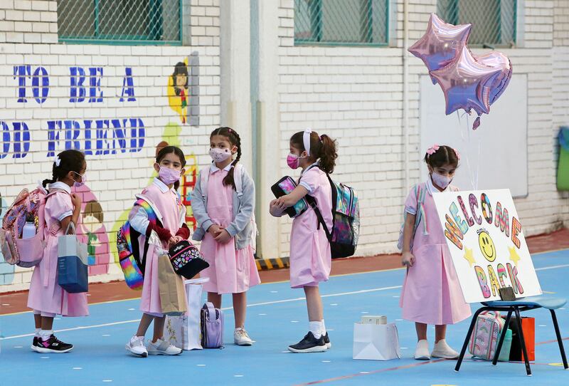 Pupils arrive at school as in-person classes resume amid the Covid-19 pandemic in Kuwait City.