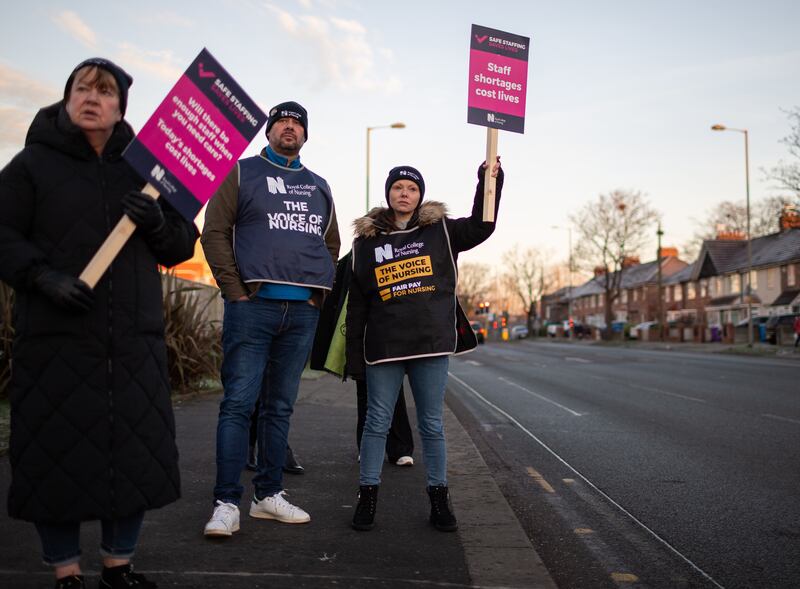 Nurses protest outside Aintree University Hospital in Liverpool. EPA