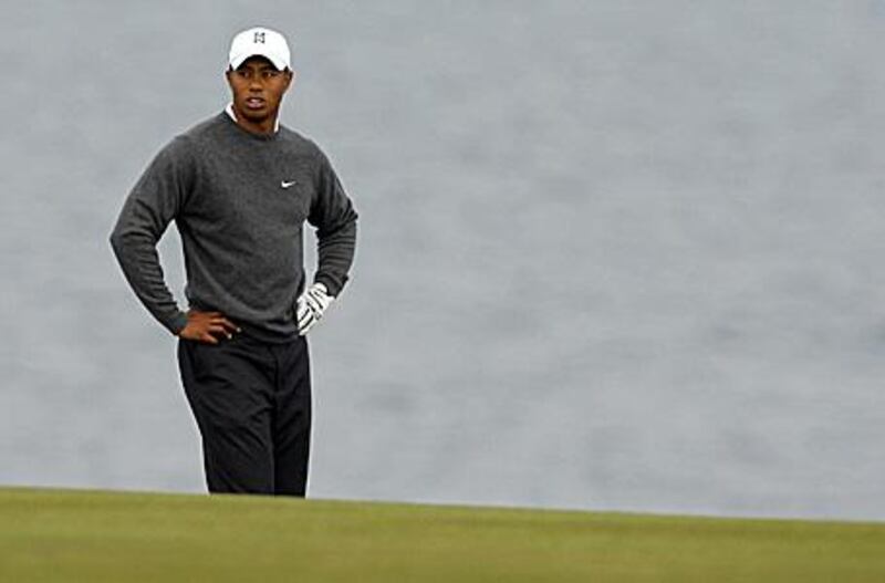 Tiger Woods stands on the ninth fairway during a practice round  yesterday ahead of the 138th British Open Championship at Turnberry Golf course in south-west Scotland, which begins tomorrow. The American hopes to mount a strong challenge, but is expecting tough weather conditions.