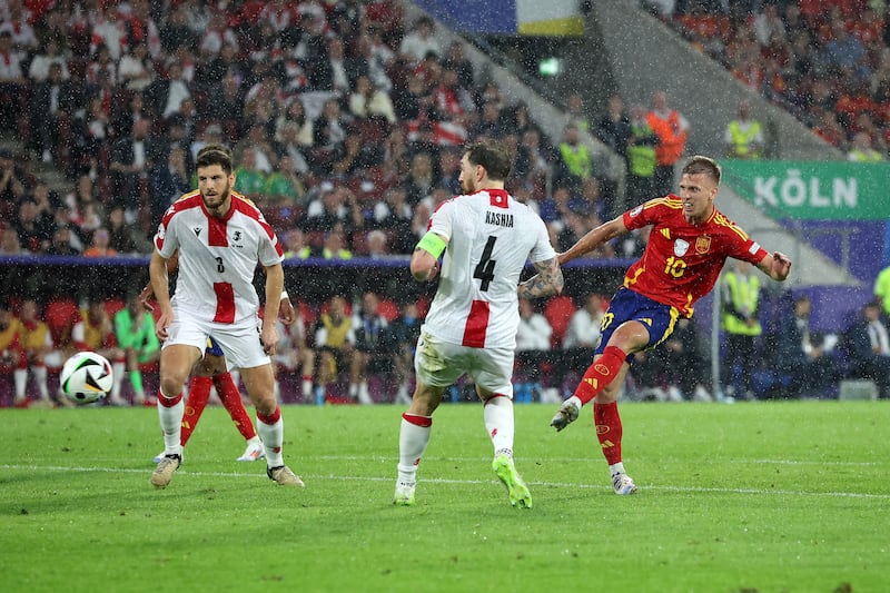 Dani Olmo of Spain scores his team's fourth goal. Getty Images