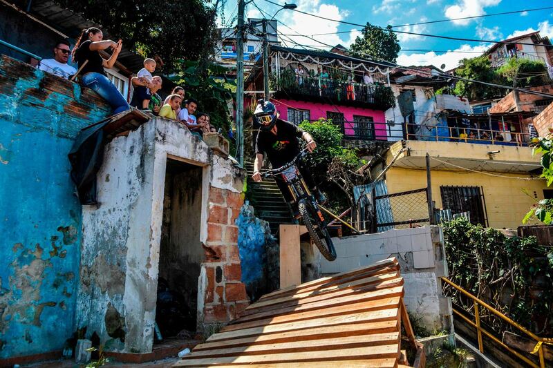 US extreme mountain bike athlete Ray Syron takes part in the Downhill Challenge Medellin, Colombia. AFP