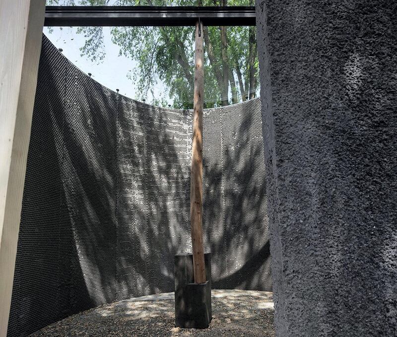 Smiljan Radic of Chile, a hot star among architects today, designed a black cone of a chapel, its black walls enclosed in wire mesh. As a crude shelter, it seemed solid, with plexi-glass covering its open roof.&nbsp;&nbsp;&nbsp;</p>