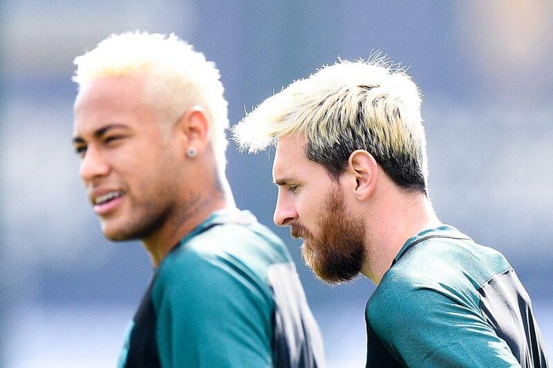 Neymar and Lionel Messi at Barcelona training on Monday ahead of their Champions League tie with Celtic. David Ramos / Getty Images
