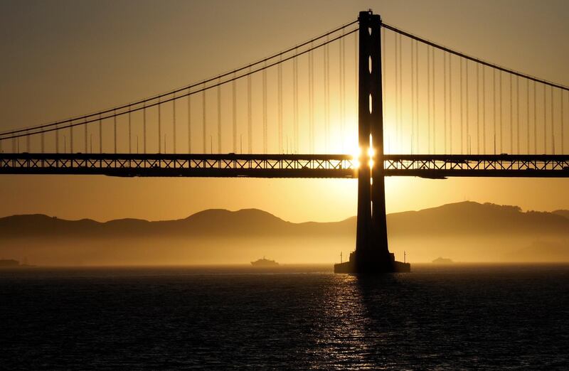 The San Francisco Bay Bridge and Marin Headlines at sunset as seen from the San Francisco Bay in San Francisco, California. John G. Mabanglo / EPA