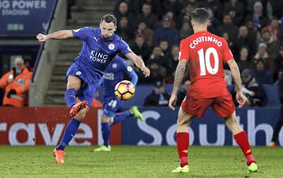 Leicester City's English midfielder Danny Drinkwater (L) shoots to score their second goal during the English Premier League football match between Leicester City and Liverpool at King Power Stadium in Leicester, central England on February 27, 2017. / AFP PHOTO / ADRIAN DENNIS / RESTRICTED TO EDITORIAL USE. No use with unauthorized audio, video, data, fixture lists, club/league logos or 'live' services. Online in-match use limited to 75 images, no video emulation. No use in betting, games or single club/league/player publications.  / 