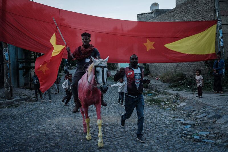 A man on a horse painted in colours of the Tigray flag poses as they celebrate the return of soldiers of Tigray Defence Force (TDF) on a street in Mekelle, the capital of Tigray region, Ethiopia.