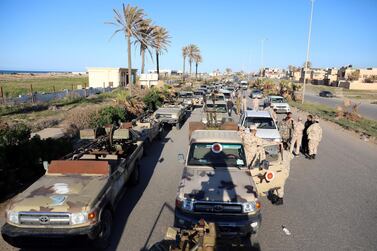 Military vehicles of Misrata forces, under the protection of Tripoli's troops, are seen in Tajura neighborhood , east of Tripoli. Reuters