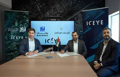 From left, Rafal Modrzewski, chief executive of ICEYE, Hasan Al Hosani, chief executive of Bayanat and Ali Al Hashemi, chief executive of Yahsat. Photo: ICEYE