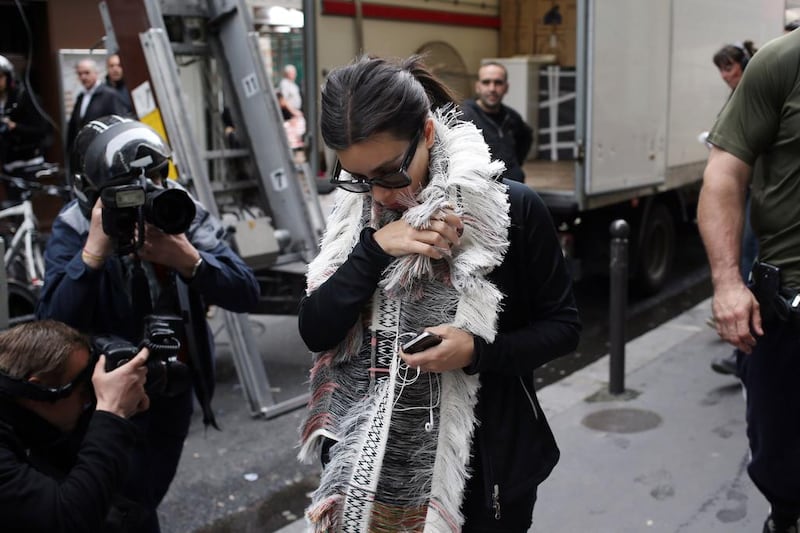 Kim Kardashian walks in a street of Paris on May 22, 2014. Kardashian and partner Kanye West are expected to be tying the knot this weekend. Florence’s La Nazione daily reported that they would have a marriage ceremony in France early on May 24, before travelling to Italy for the party. Kenzo Tribouillard / AFP photo