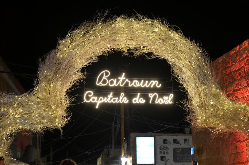 The slogan 'Batroun, capital of Christmas', is displayed above the entrance to the festival in the Lebanese city of Batroun. All photos: Finbar Anderson