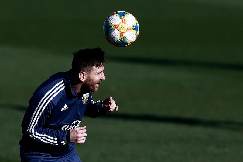 Argentina forward Lionel Messi takes part in heading practice. AFP
