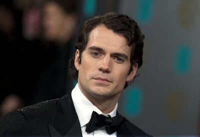 British actor Henry Cavill poses on the red carpet upon arrival to attend the annual BAFTA British Academy Film Awards at the Royal Opera House in London on February 10, 2013.  AFP PHOTO/ANDREW COWIE
 *** Local Caption ***  459245-01-08.jpg