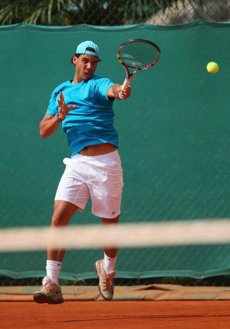Rafael Nadal works hard during practice for the ATP Monte Carlo Rolex Masters on April 14, 2014 in Monaco. Julian Finney / Getty Images