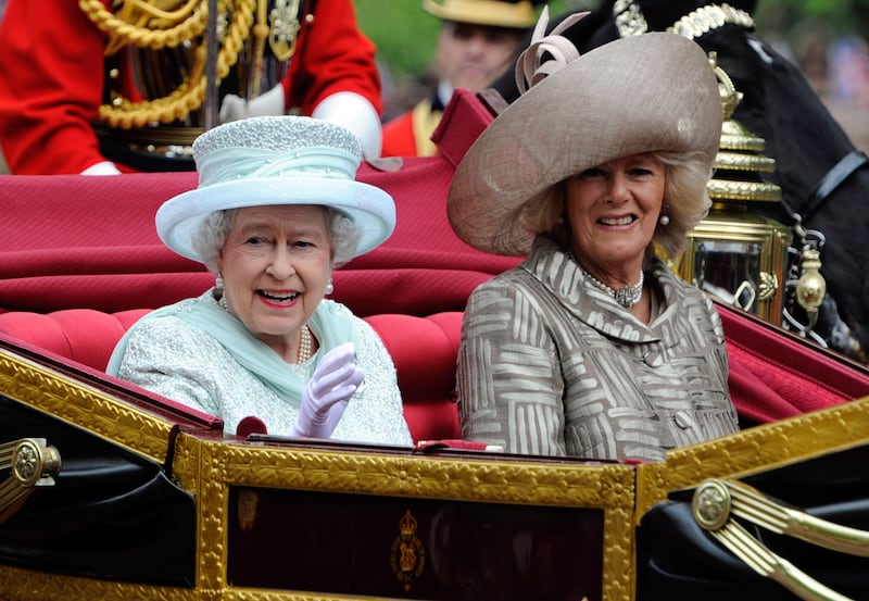 Queen Elizabeth and the duchess are driven along The Mall after a diamond jubilee service of thanksgiving at St Paul's Cathedral in London, 2012