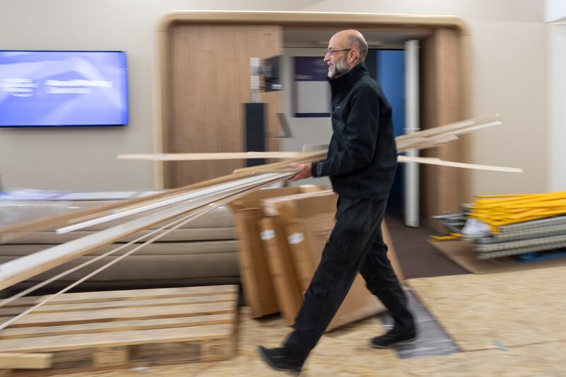 Staff put the final touches to one of the conference halls in Davos. Photo: WEF