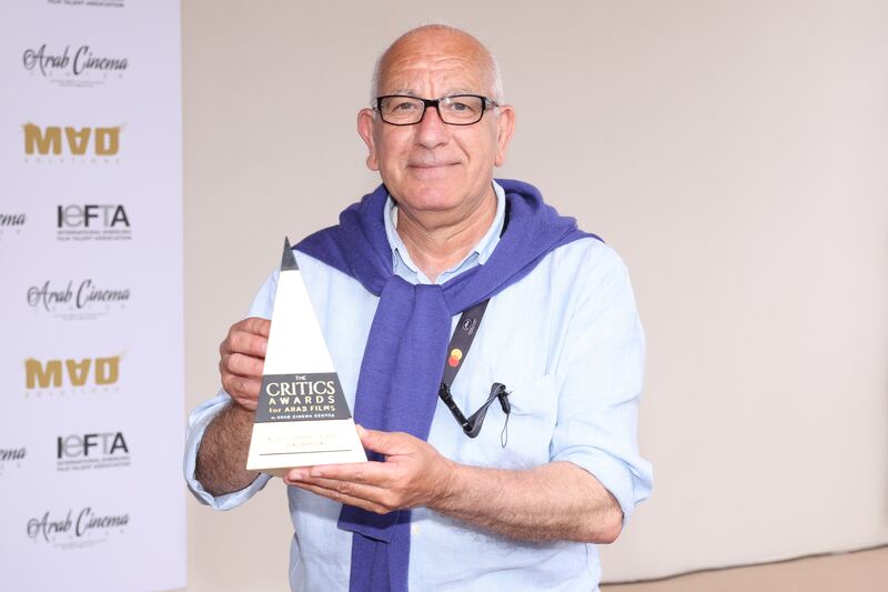 Ziad Khuzai receives an award.