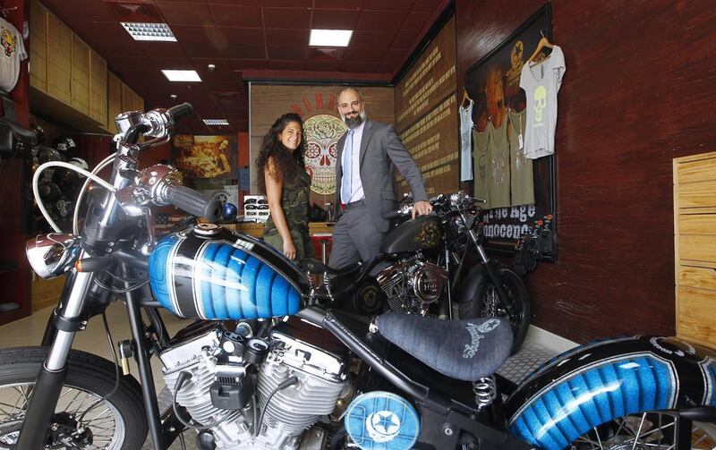 Tarek and Sigrid Azmi, the owners of Rumble Motorcycles, proudly displays their exquisitely design shop. Jeffrey E Biteng / The National