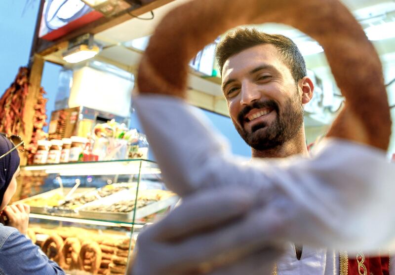 Abu Dhabi, United Arab Emirates, January 5, 2020.  
Photo essay of Global Village.-- Azat Lale, 24, Morocco. Has been working for the K-14 Turkish pastry stall at the Global Village for three years now.
Victor Besa / The National
Section:  WK
Reporter:  Katy Gillett