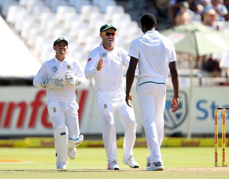CAPE TOWN, SOUTH AFRICA - JANUARY 06: Faf du Plessis and Kagiso Rabada during day 2 of the 1st Sunfoil Test match between South Africa and India at PPC Newlands on January 06, 2018 in Cape Town, South Africa. (Photo by Carl Fourie/Gallo Images)