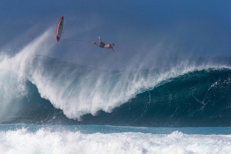 Hawaii's pro surfer Kalani Chapman wipes out while surfing Banzai Pipeline ahead of the Billabong Pipe Masters on the north shore of Oahu in Hawaii. AFP