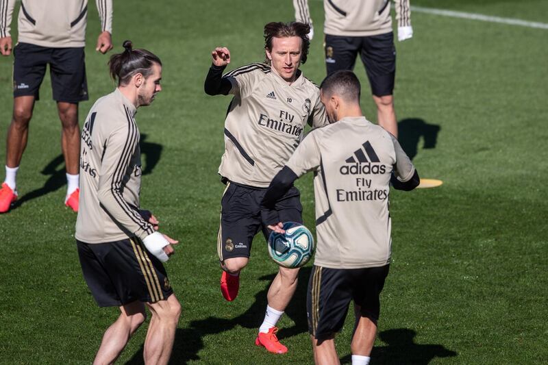 Real Madrid's Gareth Bale, Luka Modric, centre, and Eden Hazard at the Valdebebas sport city. EPA