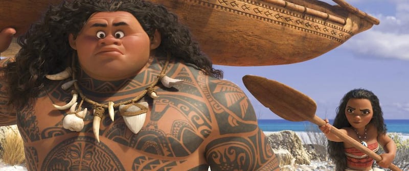This image released by Disney shows characters Maui, voiced by Dwayne Johnson, left, and Moana, voiced by Auli’i Cravalho, in a scene from the animated film, “Moana.” (Disney via AP)