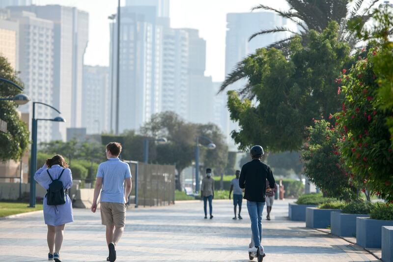 UAE residents are optimistic about the future, a global report found. Khushnum Bhandari / The National