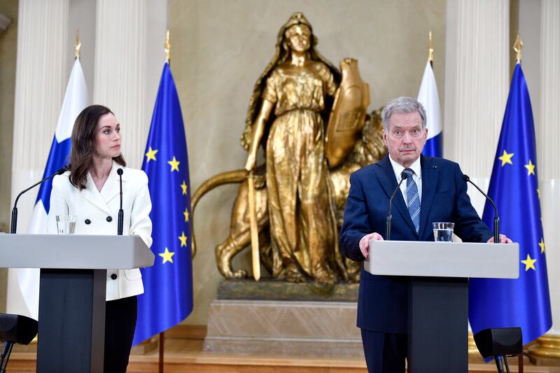 Finland's Prime Minister Sanna Marin (L) and President Sauli Niinisto hold a press conference at the Presidential Palace in Helsinki, where they announced the country's intentions to apply for Nato membership. AP