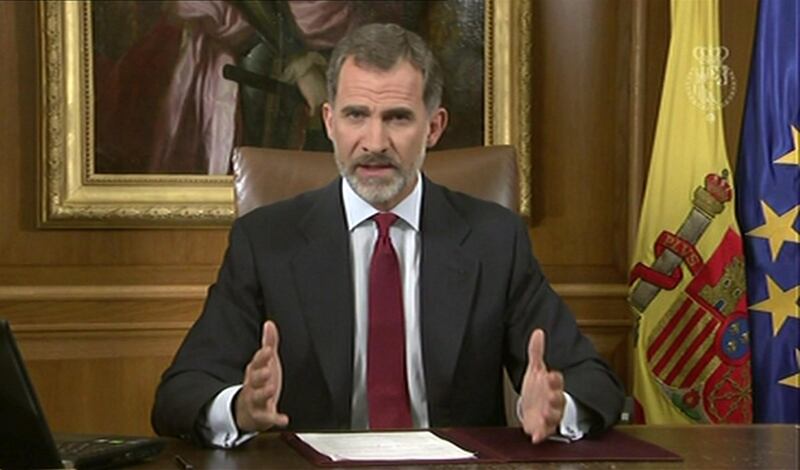 In this image taken from video released by Spanish Royal Palace, Spain's King Felipe VI delivers a speech on television from Zarzuela Palace in Madrid, Tuesday, Oct. 3, 2017. Spain's King said that Catalan authorities have deliberately bent the law with "irresponsible conduct" and that the Spanish state needs to ensure constitutional order and the rule of law in Catalonia. (Spain's Royal Palace/ Pool via AP)