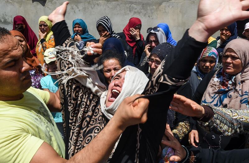 Relatives of Tunisian police officer Sgt Arbi Guizani attend his funeral on July 9, 2018, in Ettadhamen, a suburb of the capital Tunis. Six members of Tunisia's security forces were killed on July 8 in a "terrorist attack" near the border with Algeria, the country's deadliest such incident in over two years. AFP