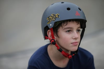 Eleven-year-old Brazilian team skater Gui Khury poses for a photograph at his grandmother's farm, days after becoming the first to land a 1080-degree turn, following the outbreak of the coronavirus disease (COVID-19), on the outskirts of Curitiba, Brazil, May 12, 2020. REUTERS/Rodolfo Buhrer