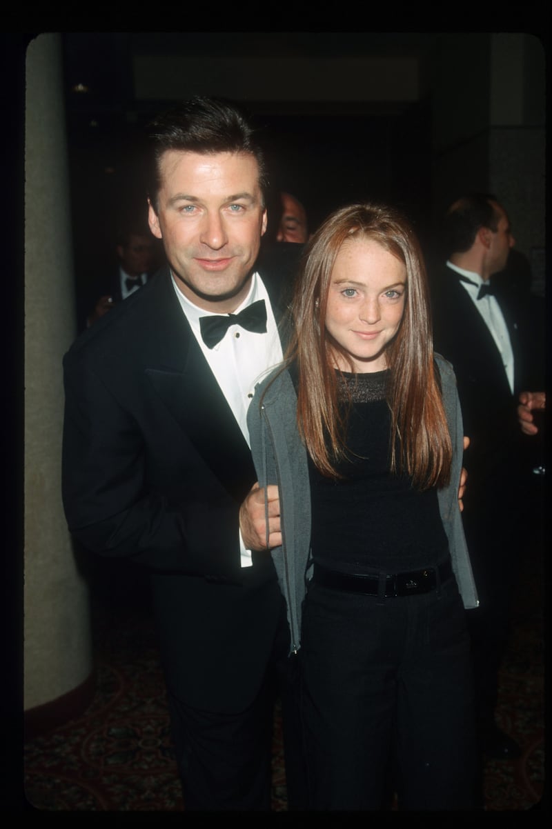 Alec Baldwin and Lindsay Lohan, in a black top and grey hoodie, attend the Baldwin Cancer Benefit in New York City on October 8, 1999. Photo: Liaison