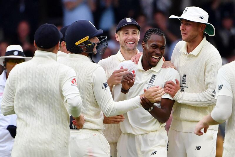 England's Jofra Archer (2nd R) celebrates taking the wicket of Australia's Matthew Wade (unseen) on the first day of the third Ashes cricket Test match between England and Australia at Headingley in Leeds, northern England, on August 22, 2019. RESTRICTED TO EDITORIAL USE. NO ASSOCIATION WITH DIRECT COMPETITOR OF SPONSOR, PARTNER, OR SUPPLIER OF THE ECB
 / AFP / Paul ELLIS / RESTRICTED TO EDITORIAL USE. NO ASSOCIATION WITH DIRECT COMPETITOR OF SPONSOR, PARTNER, OR SUPPLIER OF THE ECB
