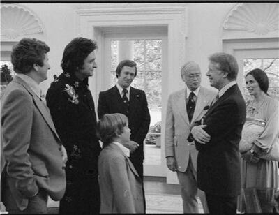 President Jimmy Carter meets Johnny Cash and June Carter Cash on June 14, 1977. Photo: National Archives