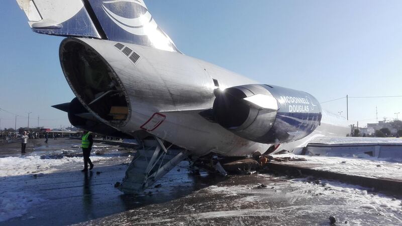 An Iranian passenger plane is seen after sliding off the runway upon landing at Mahshahr Airport, Iran.  Reuters