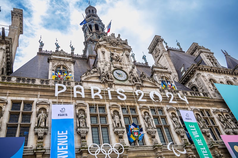The facade of Paris City Hall is decorated with the Olympic rings. EPA
