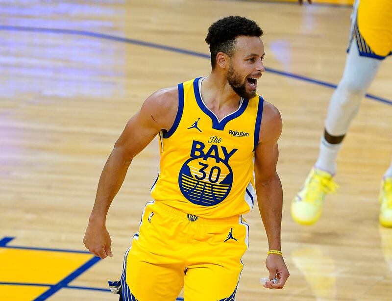 Golden State Warriors guard Stephen Curry (30) smiles after scoring his 62 points during the second half of an NBA basketball game against the Portland Trail Blazers in San Francisco, Sunday, Jan. 3, 2021. (AP Photo/Tony Avelar)
