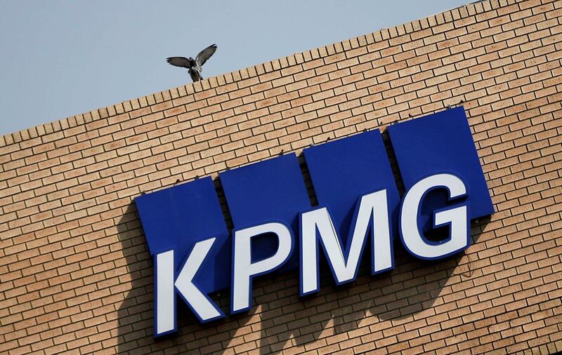 FILE PHOTO: The KPMG logo is seen at the company's head offices in Parktown, Johannesburg, South Africa, September 15, 2017. REUTERS/Siphiwe Sibeko/File Photo