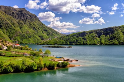 Albania offers picturesque coastlines and stunning mountain ranges. Yves Alarie / Unsplash