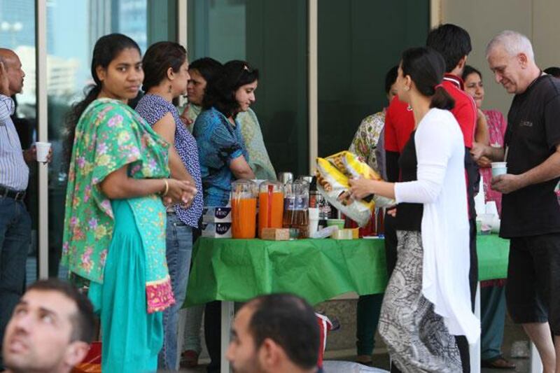 A group of residents from Tamweel Tower, as well as the nearby Al Seef buildings, set up a stall in the corner of the car park and offered tea and biscuits to those waiting.
