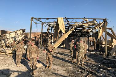 US soldiers inspect the damage from Iranian missiles at Ain Al Asad Air Base in Iraq's Anbar province on January 13, 2020. Reuters