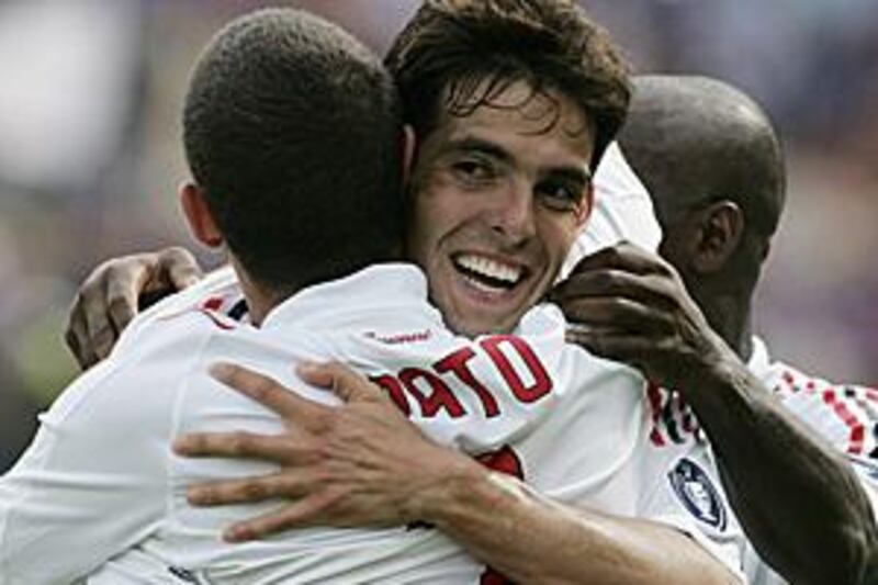 AC Milan's Kaka, centre, says that he wants to stay with the Italian club.