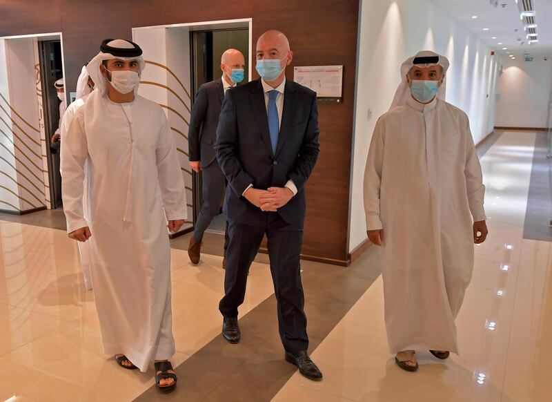 The President of the Dubai International Marine Club, Sheikh Mansour bin Mohammed bin Rashid, left, meets with Fifa President Gianni Infantino in Dubai. The UAE Football Association said Saturday it would sign a memorandum of understanding with the Israeli Football Association in Dubai. The move comes after Israel established ties with the United Arab Emirates, signing an accord along with Bahrain in Washington in September. AFP