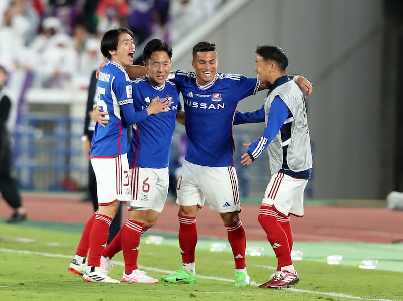 Kota Watanabe of Yokohama, second left, celebrates after scoring their second goal. Chris Whiteoak / The National